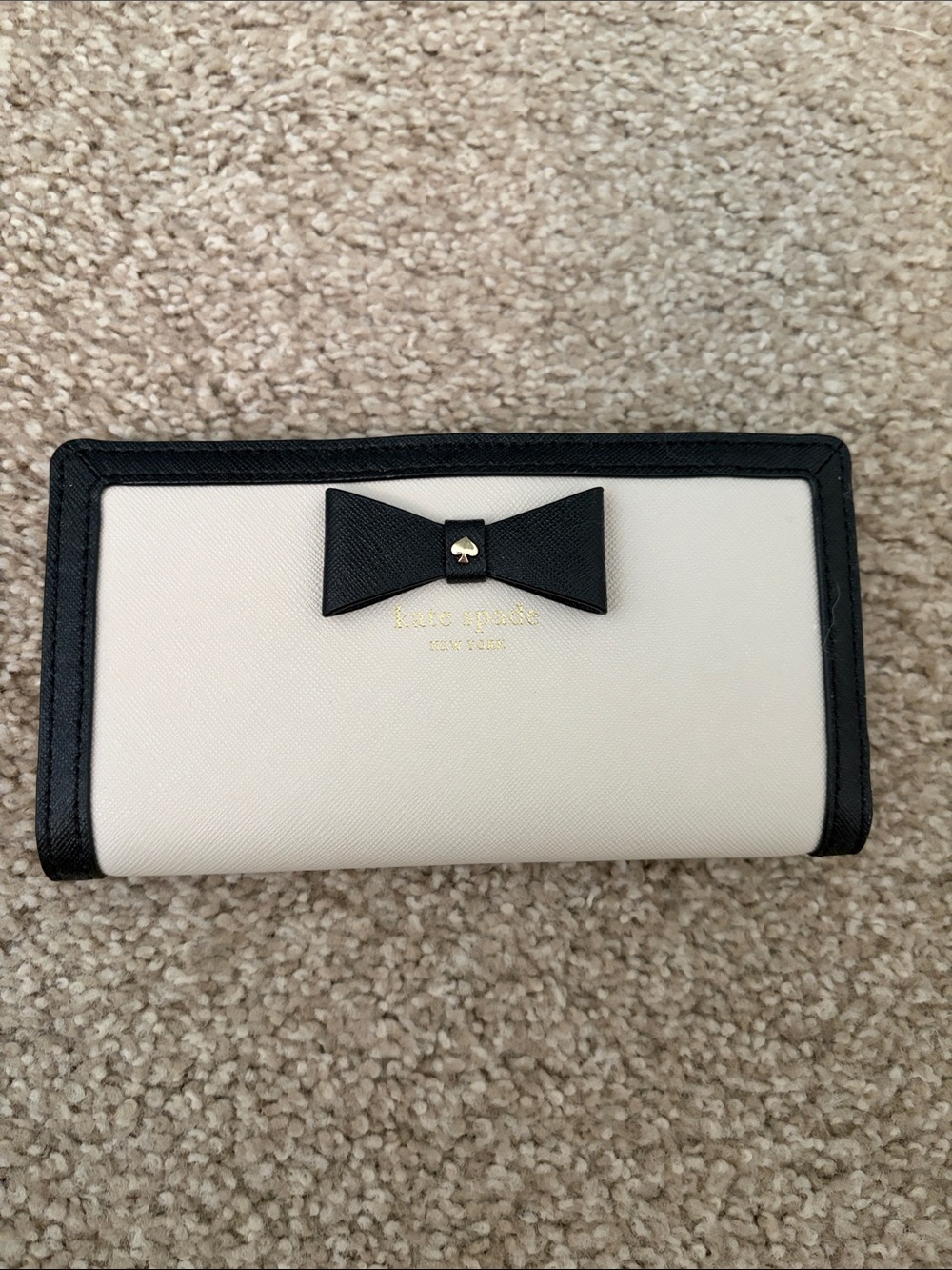 kate spade cream and black bow continental wallet